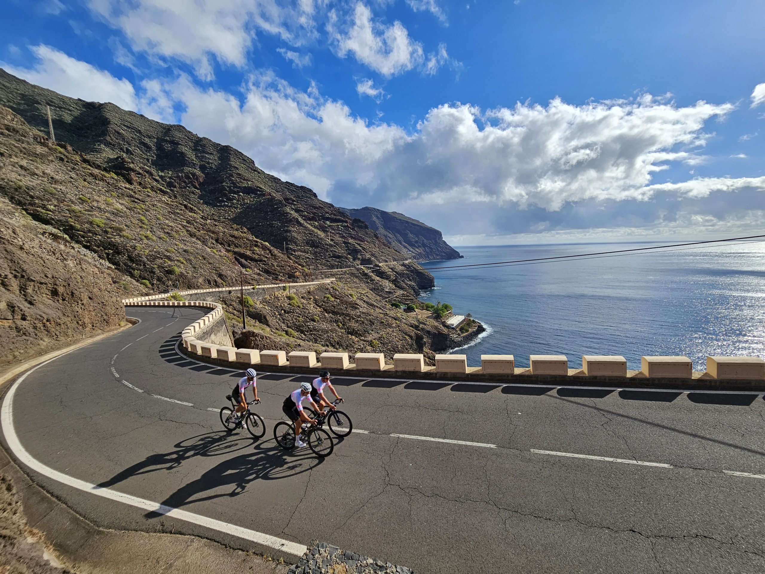 Tenerife Bike Tours riders cycling beside the coast