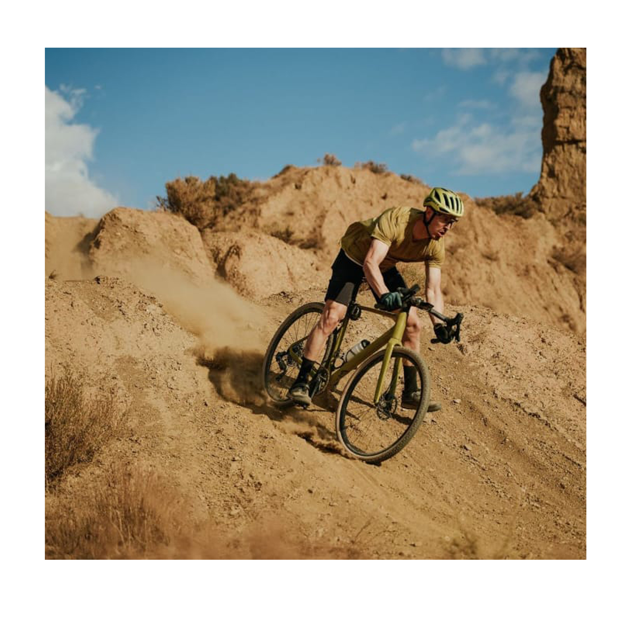 Cyclist riding through Tenerife’s volcanic landscape
